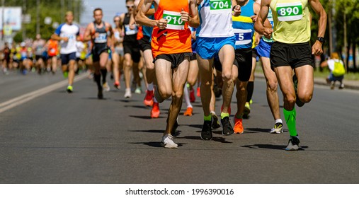 Leader Marathon Race Run Ahead Of Large Group Runners