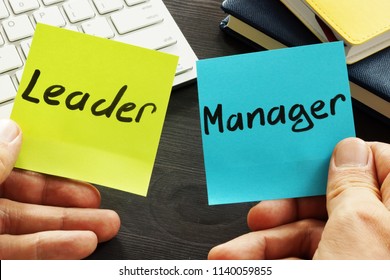 Leader Vs Manager. Man Is Holding Memo Sticks.