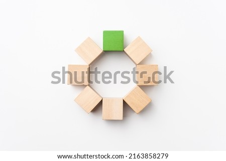 leadership, abstract, cooperation concept with green wood cube isolated on white background, for mock up, circle layout.