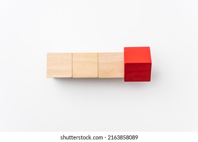 leadership, abstract, cooperation concept with red wood cube isolated on white background, for mock up, top view layout. - Shutterstock ID 2163858089