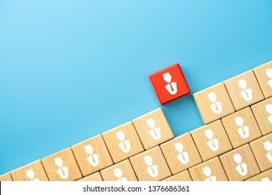 Leadership, Building A Good Team, Recruitment Business And Human Resources Concept, Wooden Blocks With People Icon On Table, Blue Background, Copy Space