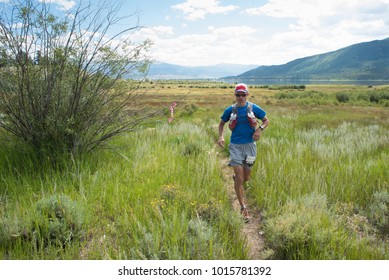 LEADVILLE, COLORADO USA - AUGUST 19, 2017: Bruce Dailey Outbound From The Twin Lakes Aid Station During The Leadville Trail 100 Ultra, Leadville, Colorado, USA.