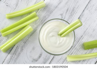 Leaf Celery Stalk Dipped In Greek Yogurt