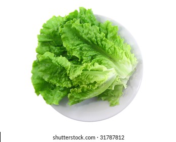 Leaf Of  Lettuce On White   Plate.Top View. Isolated