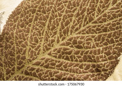 leaf pattern on fabric texture for background close up