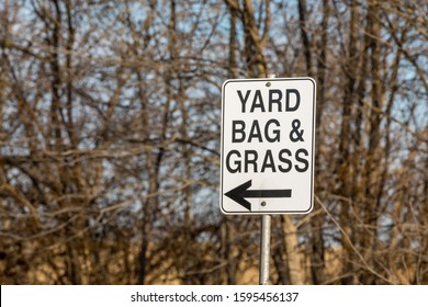 Leaf, Yard Bag, And Grass Clippings Directional Sign With Arrow At City Yard Waste Disposal, Dump Site