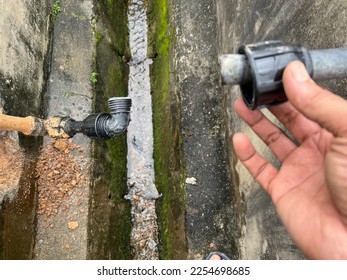 Leaked poly pipes are being repaired - Shutterstock ID 2254698685