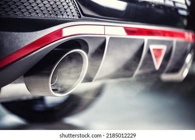 Leaking gases from the exhaust of a petrol or diesel car. - Shutterstock ID 2185012229