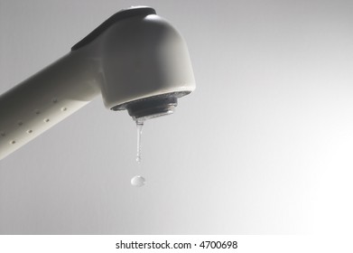 A Leaky Faucet With A Slow Drip.