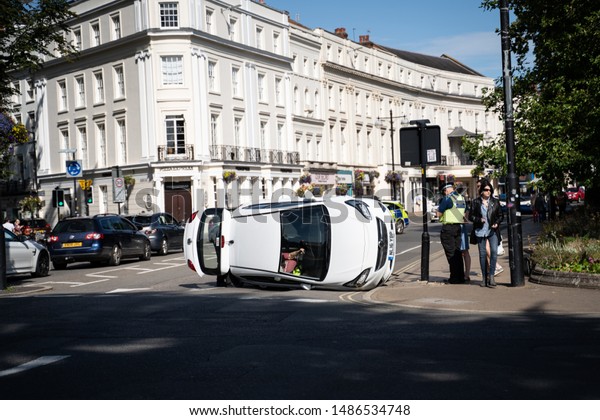 leamington spa, UK - 24 Aug 2019: Man taken to
hospital after car flips over - Car roll over in the town centre
after  illness