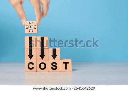 Lean or Cost reduction by Machine learning. AI or Artifice intelligence to optimize manufacturing. Decreasing expense to maximize profits. Hand put wooden cube with AI icon and cost down green arrows