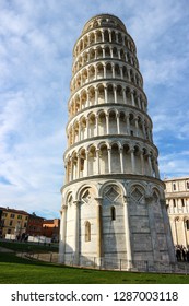 Leaning Tower Of Pisa Winter View With A Sky And Clouds, Tuscany, Italy