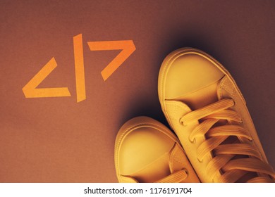 Learn computer coding concept, young student standing above the text, top view - Powered by Shutterstock - Get 15% off with code: PIKWIZARD15