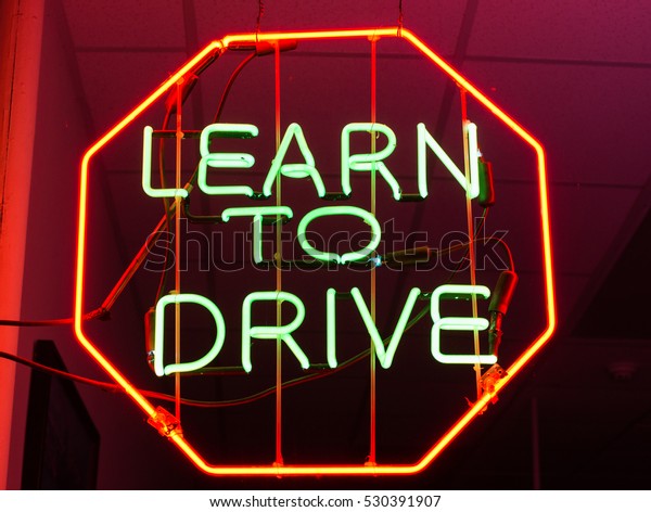 learn to drive neon\
sign