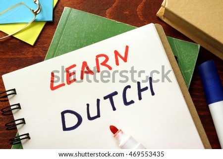 Learn dutch written in a notepad.  Education concept.