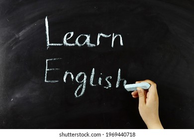 Learn English Written With Chalk On A Blackboard, A Concept For Learning Foreign Languages