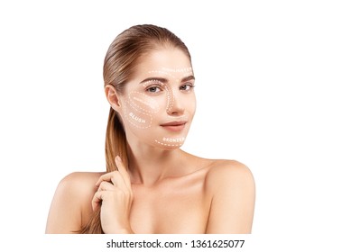 Learn how to apply your makeup. Portrait of cute and young woman with perfect skin and white dotted lines over face isolated on white background. Make up concept.