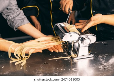 Learn how to make delicious fresh pasta using a pasta machine with this culinary class - Powered by Shutterstock