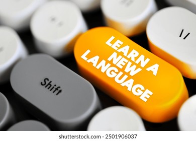 Learn a New Language - the process of acquiring the ability to understand, speak, read, and write in a language that is different from one's native or primary language, text concept button on keyboard