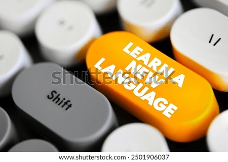 Learn a New Language - the process of acquiring the ability to understand, speak, read, and write in a language that is different from one's native or primary language, text concept button on keyboard