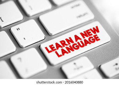 Learn A New Language text button on keyboard, concept background