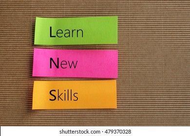 Learn New Skills Text On Colorful Sticky Notes