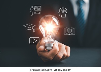 Learn technology, knowledge and e-learning skills through online courses, as a lightbulb represents new ideas where we learn from books, video, teaching and mental processing online.