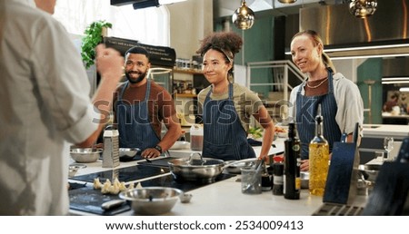Learning, chef and group in kitchen, cooking and listening to instruction, mentor and teaching in hospitality. Professional, people and culinary students with smile and skills for fine dining