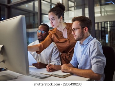 Learning, computer and training business interns in night office with manager, boss and leadership help. Men with technology planning ideas, kpi strategy and marketing innovation vision with mentor - Shutterstock ID 2208430283