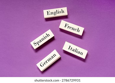 Learning foreign languages concept, words English, Italian, German, French, Spanish write on blocks