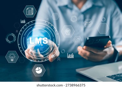 Learning management system LMS interface on touchscreen as professional uses smartphone and laptop for online training, course tracking and analytics, corporate e-learning technology, copy space. - Powered by Shutterstock - Get 15% off with code: PIKWIZARD15