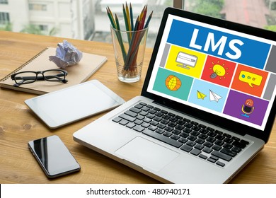 Learning Management System (LMS)  Laptop On Table. Warm Tone