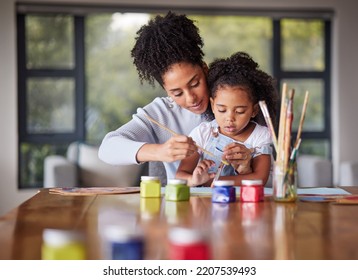 Learning, mother and child painting for an art preschool project with a young mom helping her daughter at home. Kindergarten, love and creative painter with brush teaching and drawing with a girl - Powered by Shutterstock