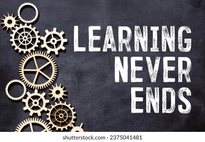 Learning never ends message on blackboard with human head shape and gears.