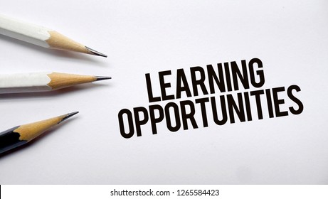 Learning Opportunities Text Memo Written On A White Background With Pencils