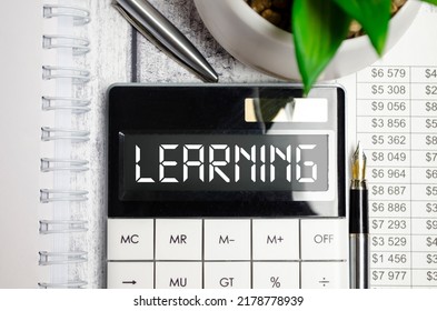 Learning Outcomes Text On A Calculator And Pen