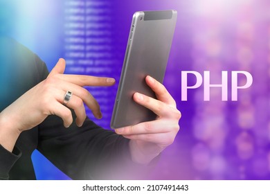 Learning PHP Programming Concept. PHP Logo next to tablet computer. PHP training via tablet. Personal Home Page abbreviation on purple. Hypertext Preprocessor Web scripting language.