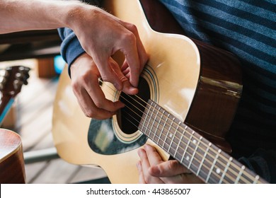 Learning To Play The Guitar. Music Education And Extra-curricular Lessons.