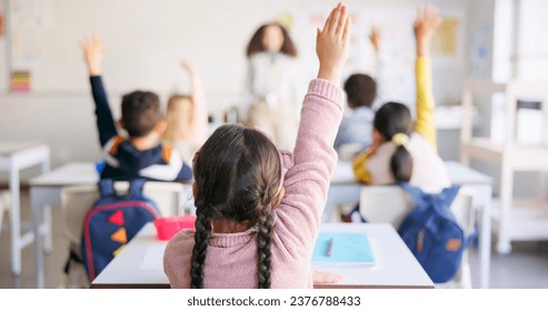 Learning, question and hands raised with girl in classroom for education, discussion and knowledge. Help, studying and teacher with children and woman at school for why, scholarship and answer - Powered by Shutterstock