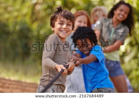 Similar – Image, Stock Photo Crop African kids playing mini football on foosball table
