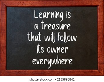 Learning Treasure Motivational Quote On Blackboard Stock Photo ...