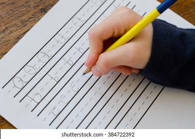 Learning to write abc - Shutterstock ID 384722392