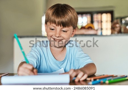 Learning, writing and boy with homework, education and creative assignment for child development with smile. House, student and book to practice handwriting, spelling and grammar with art project