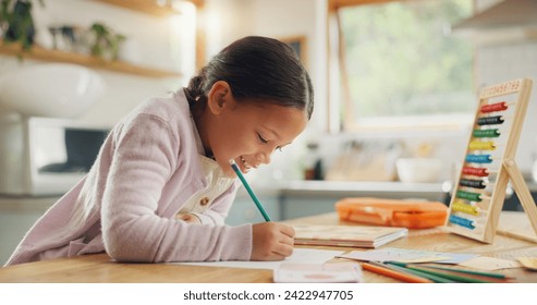 Learning, writing and happy girl child in a kitchen with maths, homework or counting practice in her home. Education, creative and kid student smile while drawing on table for homeschool art lesson - Powered by Shutterstock