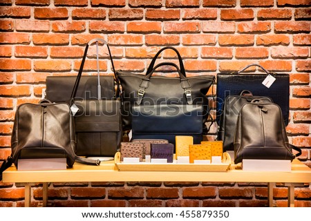 The leather bag on the shelf in store window at thailand.