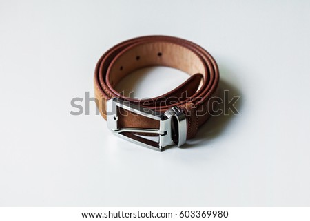 Leather belt isolated on white background.