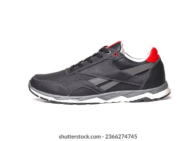 Leather black men's sneakers. Men's casual sports shoes. Fashionable sneakers