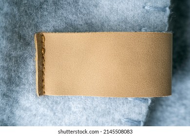 Leather Blank Label, Brown Patch On A Blanket As Mockup, Space For Text