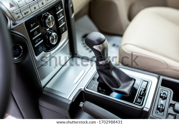 Leather car\
interior, light upholstery. Toyota Comfortable car, interior\
cleaning. Control panel, automatic transmission, car steering\
wheel. Shymkent Kazakhstan April 3,\
2020