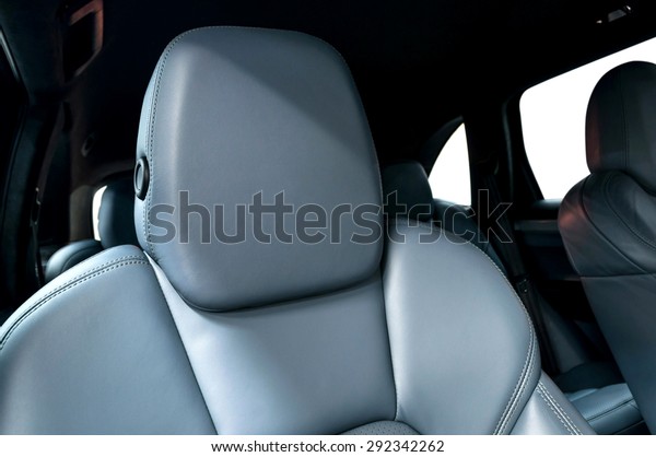 Leather car\
seats. Interior detail. Horizontal\
photo.